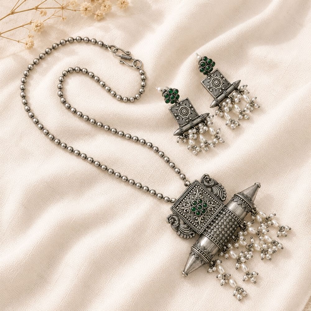 Avvni Silver Replica Long Necklace Set | Avvni The Store Oxidised Silver Replica Long Necklace Set, Silver replica jewellery with emerald green stone jewellery and pearl jewellery
