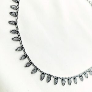 close up of oxidised teardrop minimal choker necklace, oxidised choker, minimal choker necklace. oxidised jewellery