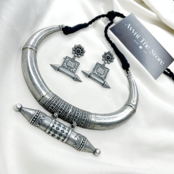Rustic Tribal Heritage Oxidised Hasli Set, Oxidised silver tribal Hasli necklace set with single engraved pendant and matching ethnic earrings by Avni The Store