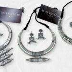 Handcrafted Haslis, Handcrafted oxidised Hasli necklace with intricate metalwork showcasing traditional Indian craftsmanship.