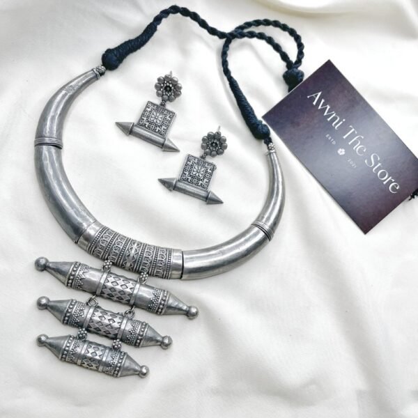 Long Oxidised Hasli Set, Tribal oxidised silver replica Hasli necklace set with engraved cylindrical pendants and matching ethnic earrings by Avni The Store