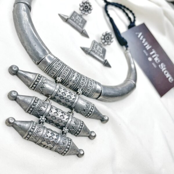 Long Oxidised Hasli Set, Tribal oxidised silver replica Hasli necklace set with engraved cylindrical pendants and matching ethnic earrings by Avni The Store