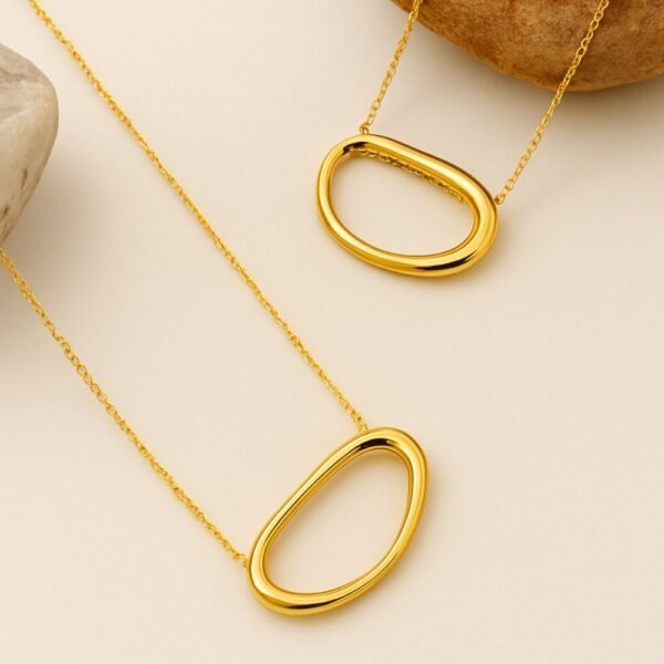 Oval Anti Tarnish Necklace, Minimalist gold oval pendant necklace on a delicate chain, displayed against a clean white background with soft professional lighting. Oval Anti Tarnish Necklace