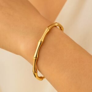 Gold Plated Bamboo Link Cuff Bracelet worn on wrist — polished bamboo links, 18K gold plated