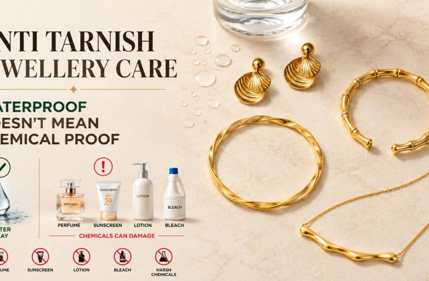 Gold anti tarnish jewellery care guide featuring shell earrings, a twisted bangle, and a wavy bar necklace on a marble background with water droplets, alongside perfume, sunscreen, lotion, and bleach to illustrate that waterproof jewellery is not chemical proof.