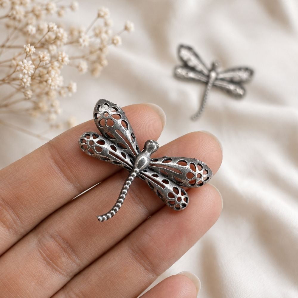 Avvni Oxidised Silver Dragonfly Stud Earrings | Avvni The Store Close-up of Oxidised Silver Dragonfly Stud Earrings