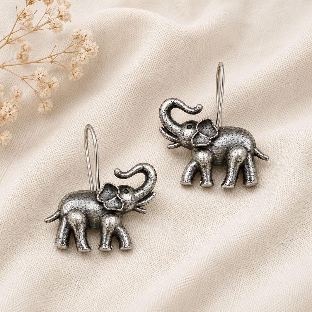 Avvni Oxidised Silver Elephant Drop Earrings | Avvni The Store Close-up of detailed oxidised silver elephant drop earrings