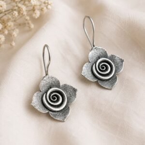 Close-up of Oxidised Silver Floral Drop Earrings