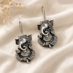 Close-up of Oxidised Silver Ganesha Drop Earrings