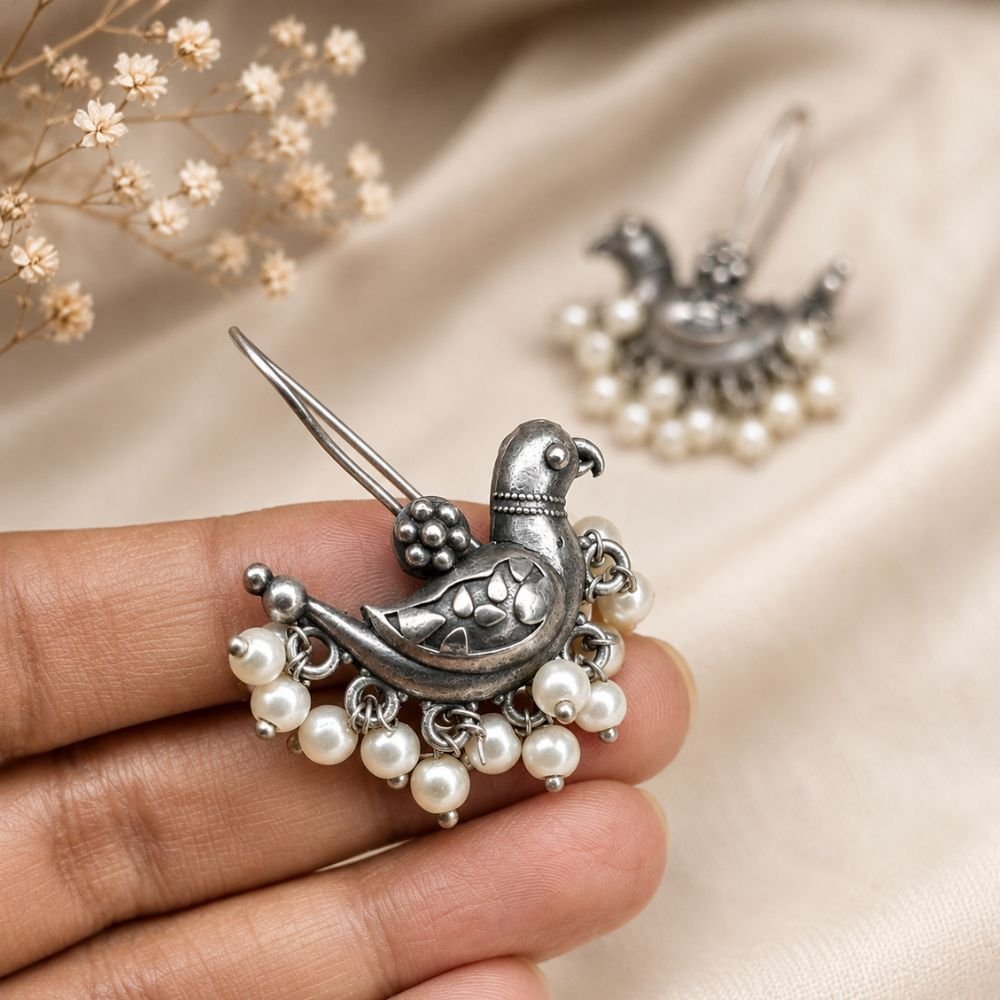 Avvni Oxidised Silver Peacock Pearl Drop Earrings | Avvni The Store oxidised-silver-peacock-earrings-close-up.jpg